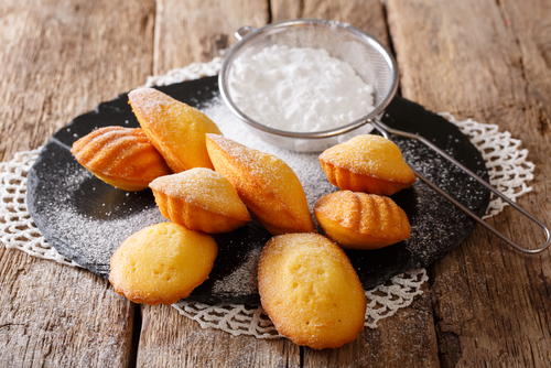Homemade Madeleines dusted with Powder Sugar